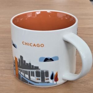Starbucks Orange and White Cityscape Mug
